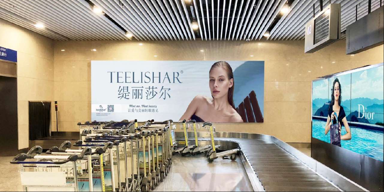 西藏林芝机场行李提取厅墙体灯箱广告